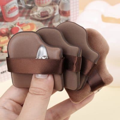 Silicone and makeup sponge set for skincare and cosmetic application, brown color, compact and portable design, ideal for beauty routines, available at Monalisa Medical Store.