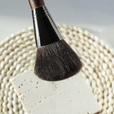 Precise makeup brush with soft bristles for professional beauty applications at Monalisa Store. Ideal for flawless foundation, powder, or blush application in cosmetic and skincare routines.