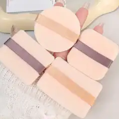 Silicone beauty blender sponges with satin ribbons, ideal for flawless makeup application, available at Monalisa Medical Store. Perfect for beauty enthusiasts and professional makeup artists.