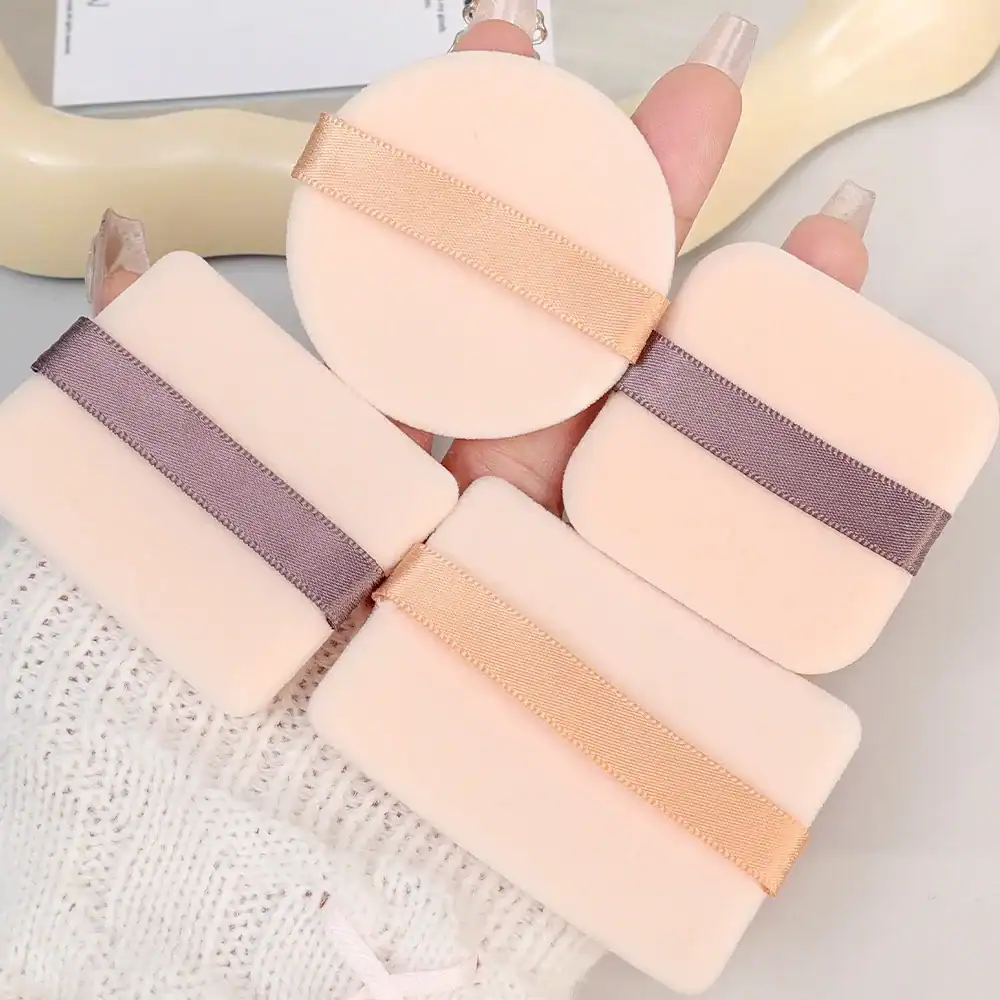 Silicone makeup sponge blenders with satin ribbons for foundation, ideal for flawless makeup application, available at Monalisa Medical Store.