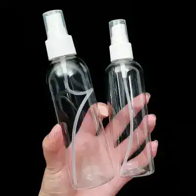 Clear plastic spray bottles for skincare or cosmetic use, empty vaporizer bottles, refillable atomizer spray containers for personal care products, lightweight transparent bottles for essential oils, reusable cosmetic spray bottles for health and beauty routines.