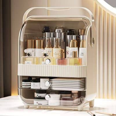 Luxurious skincare products organized in a stylish white and gold storage container at Monalisa Store, emphasizing beauty, skincare, and premium cosmetics for optimal skincare routines.