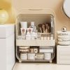Elegant skincare storage organizer with beauty products and brushes, perfect for maintaining an organized and stylish vanity area. Ideal for skincare enthusiasts and beauty lovers.