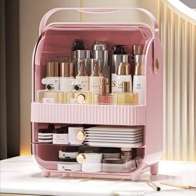 Pink acrylic skincare and cosmetic storage organizer with multiple trays for serums, creams, and beauty tools, ideal for beauty salons and personal vanity setups.