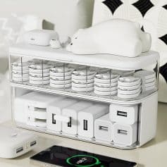 Wireless charging station with multiple charging cables, electronic accessories, and a white bear-shaped night light, designed for modern medical or cosmetic clinics to keep devices organized and charged.