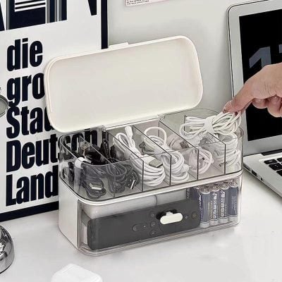 Charging cable organizer with compartments for different types of cords, batteries, and electronic accessories at Monalisa Store. Perfect for decluttering your workspace and keeping charging essentials organized.