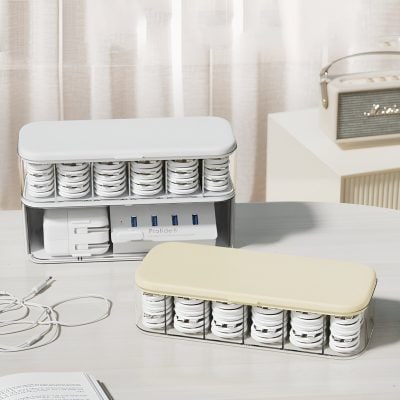 Charging station with multiple ports for medical devices and accessories at Monalisa Store optometry clinic.