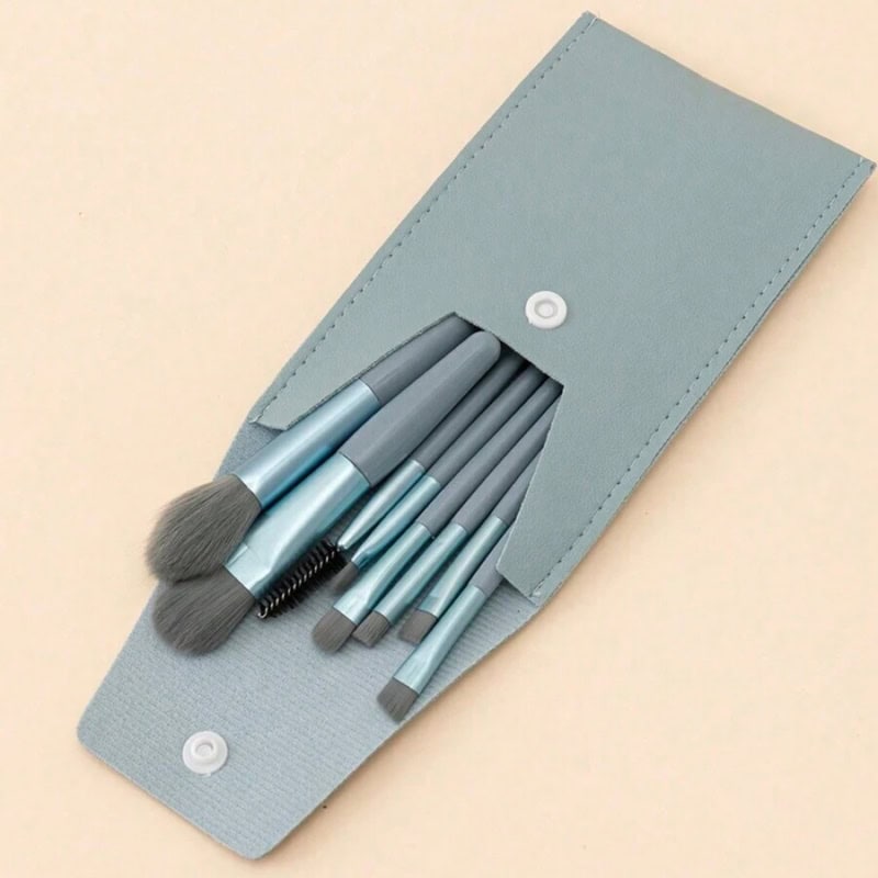 Professional makeup brush kit in a sleek gray carrying case for flawless beauty and skincare routines. Perfect for cosmetic application, blending, and contouring.