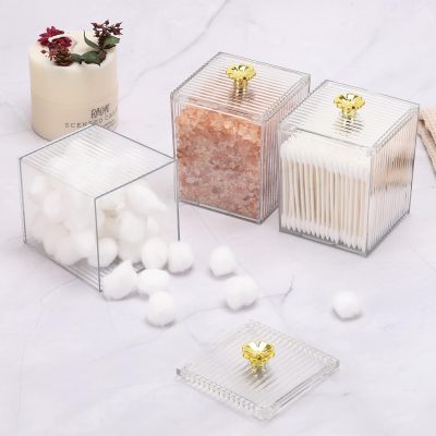 Cream-colored wax warmer with pink Himalayan salt and cotton swabs storage containers, enhancing modern aesthetic and functionality in skincare or aesthetic clinics.