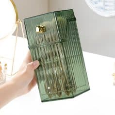 Green glass pen holder with gold accents, perfect for beauty and skincare organization at Monalisa Store.