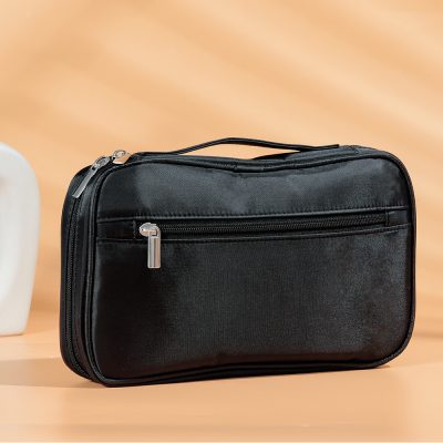 Versatile black travel or medical bag for organizing and storing essential items at Monalisa Medical Store. Ideal for professionals and personal use.
