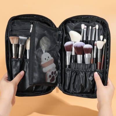 Professional makeup brush set in a black carrying case, ideal for beauty lovers and makeup artists, featuring various brushes for face, eyes, and blending, perfect for daily use and travel.