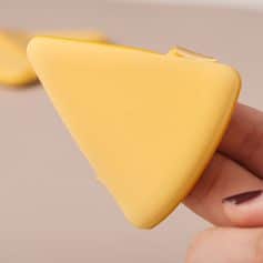 Soft yellow beauty sponge for makeup application, blending, and skincare routine. Ideal for achieving flawless, natural looks with smooth, even coverage. Perfect for professional and personal use.