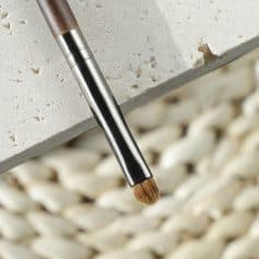 Precision makeup brush for flawless beauty application, ideal for face, eye, and concealer, crafted with soft, high-quality bristles for a professional finish.