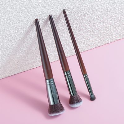 Soft-focus makeup brushes with wooden handles and synthetic bristles, ideal for skincare and cosmetic application at Monalisa Store.