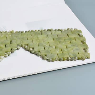 Aesthetic green jade jewelry on display, including beaded necklaces and rectangular jade pendants, showcasing high-quality craftsmanship and elegant accessories available at Monalisa Medical Store.