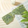 Green mosaic tile eyeglasses frame with beaded border, stylish and eco-friendly design for optometry or eyewear fashion.