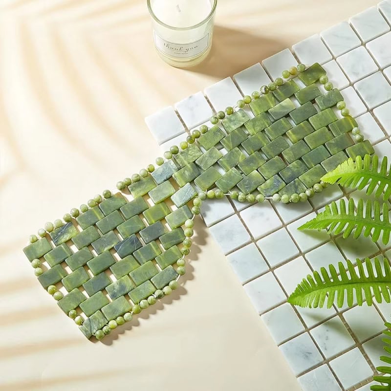 Green mosaic tile eyeglasses frame with beaded border, stylish and eco-friendly design for optometry or eyewear fashion.