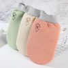 Soft pastel-colored exfoliating washcloths with gray elastic bands, featuring a palm tree logo, ideal for skincare routines, from Monalisa Store.