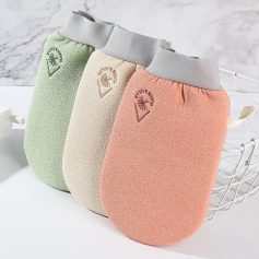 Soft pastel-colored exfoliating washcloths with gray elastic bands, featuring a palm tree logo, ideal for skincare routines, from Monalisa Store.