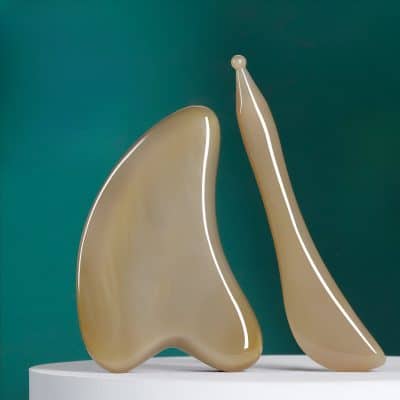 Sculptural abstract art pieces in beige tones, sleek and modern design, perfect for contemporary home decor and aesthetic enhancement.