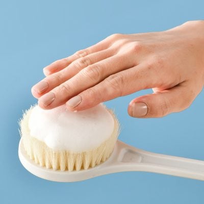 Cleaning skincare brush with foam for facial cleansing at Monalisa Store, opt for skincare tools and beauty accessories online.