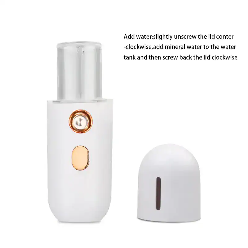 Mini portable facial steamer with water tank and adjustable lid for skincare, facial cleansing, and moisturizing. Easy to use for at-home beauty treatments and skincare routines.