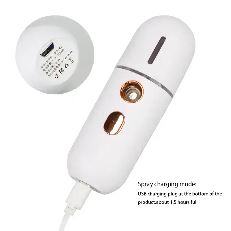 Lightweight white portable vacuum device with USB charging port, suitable for skincare or facial treatments, featuring spray charging mode for extended use.