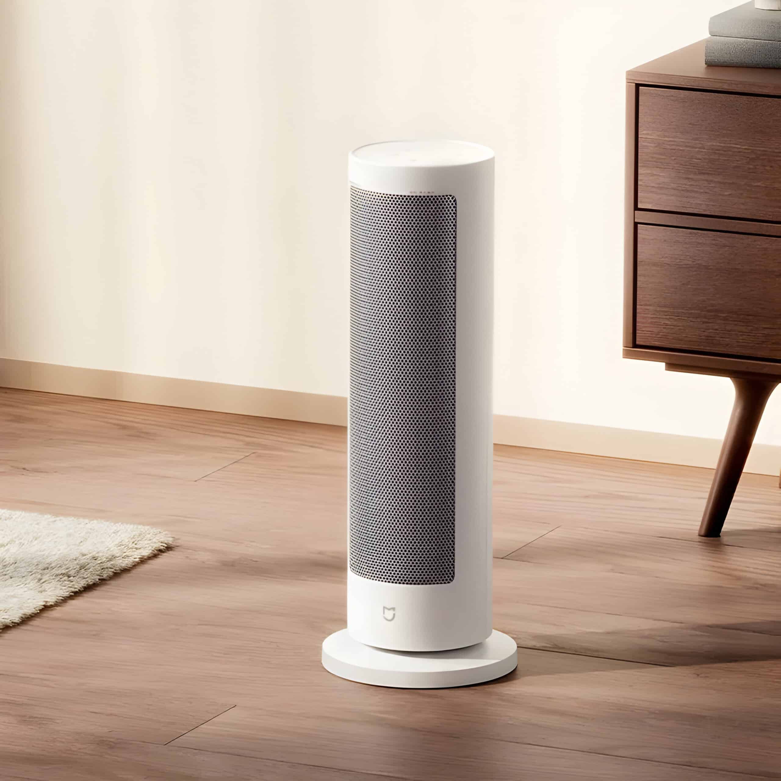 Sleek white tower fan on wooden floor in modern home, energy-efficient and quiet, ideal for home cooling and air circulation, Monalisa Store, high-quality air comfort appliance for modern living.