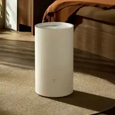 Sleek white air purifier for indoor air quality enhancement, featuring modern design and advanced filtration technology, ideal for home and office use to ensure fresh and clean air.