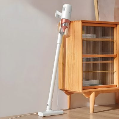 Cordless handheld vacuum cleaner for home cleaning, lightweight and efficient. Perfect for dust removal on furniture, floors, and easy storage with modern design.