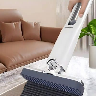 High-tech vacuum cleaner in modern living room, emphasizing cleaning and home comfort, ideal for SEO related to household appliances and cleaning solutions.