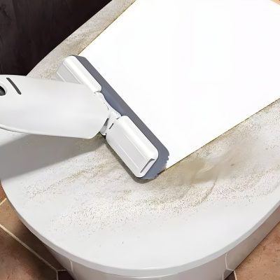 Deep cleaning robot vacuum on a white station for efficient home or office cleaning services.