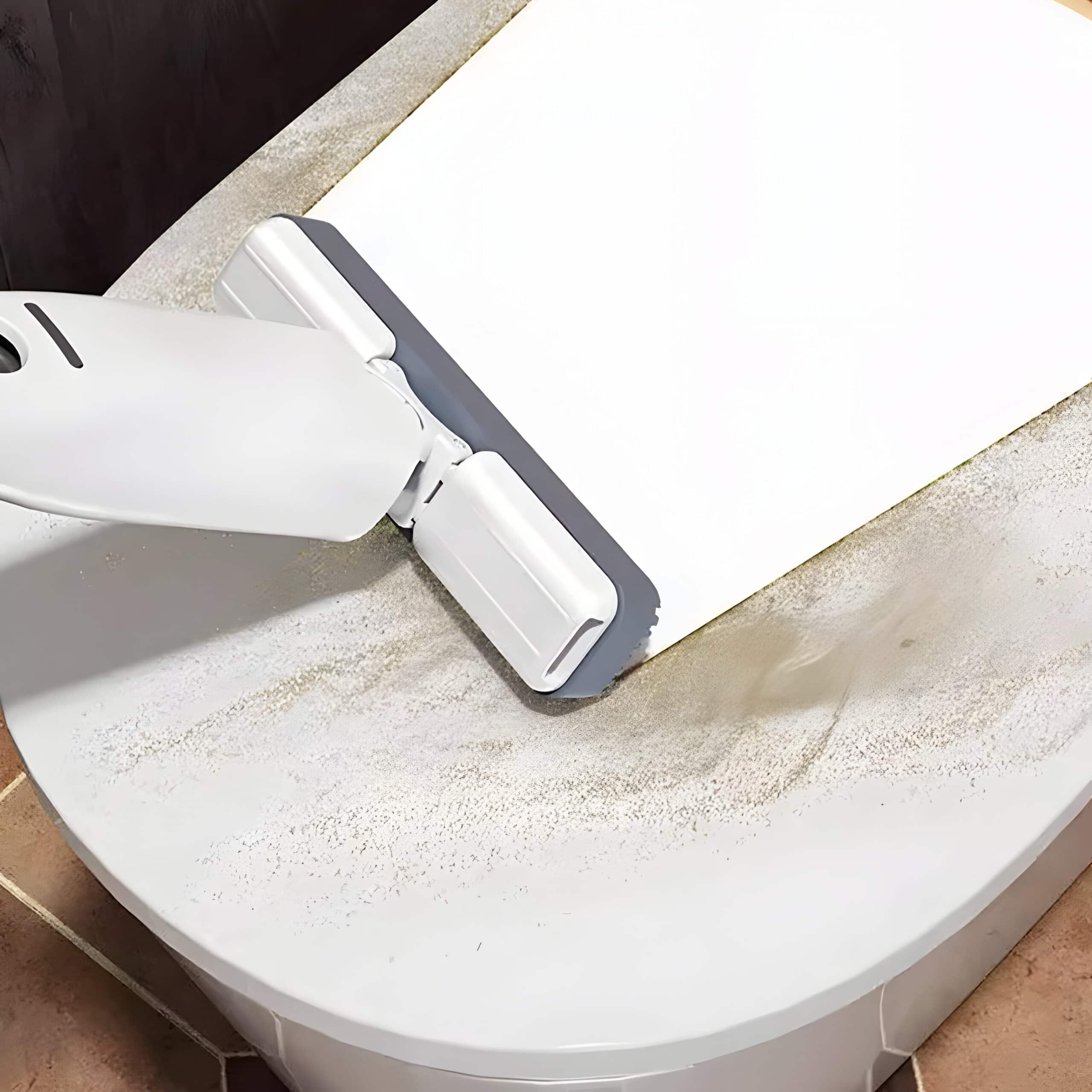 Deep cleaning robot vacuum on a white station for efficient home or office cleaning services.