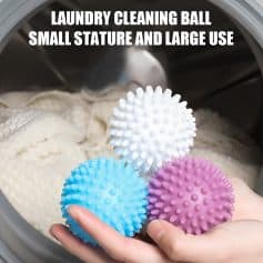 White and pink laundry cleaning balls with textured surface for effective washing.