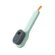 Microfiber cleaning brush with ergonomic handle for effective kitchen or home cleaning tasks.
