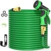 Flexible garden hose with spray nozzle and accessories for outdoor watering and gardening tasks.