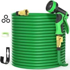 Flexible garden hose with spray nozzle and accessories for outdoor watering and gardening tasks.