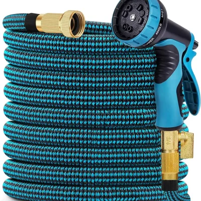 High-quality garden hose with a spray nozzle in blue and black, ideal for watering and outdoor cleaning tasks. Durable and flexible garden equipment for home and professional use.