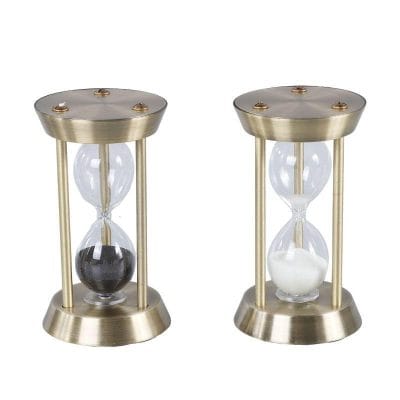 Vintage-style hourglass timers with gold finish for home decor and office accessories.
