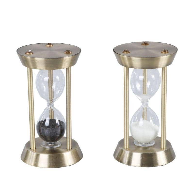 Vintage-style hourglass timers with gold finish for home decor and office accessories.