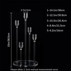 Elevated photo of a modern glass candle holder set with 5 different heights on a black background, showcasing elegant crystal design for home decor or special occasions.