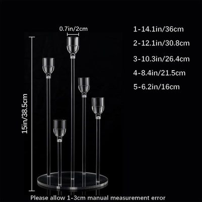 Elevated photo of a modern glass candle holder set with 5 different heights on a black background, showcasing elegant crystal design for home decor or special occasions.