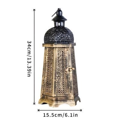 Antique Moroccan lantern with intricate metalwork, perfect for ambient lighting and decorative use in homes or spas.