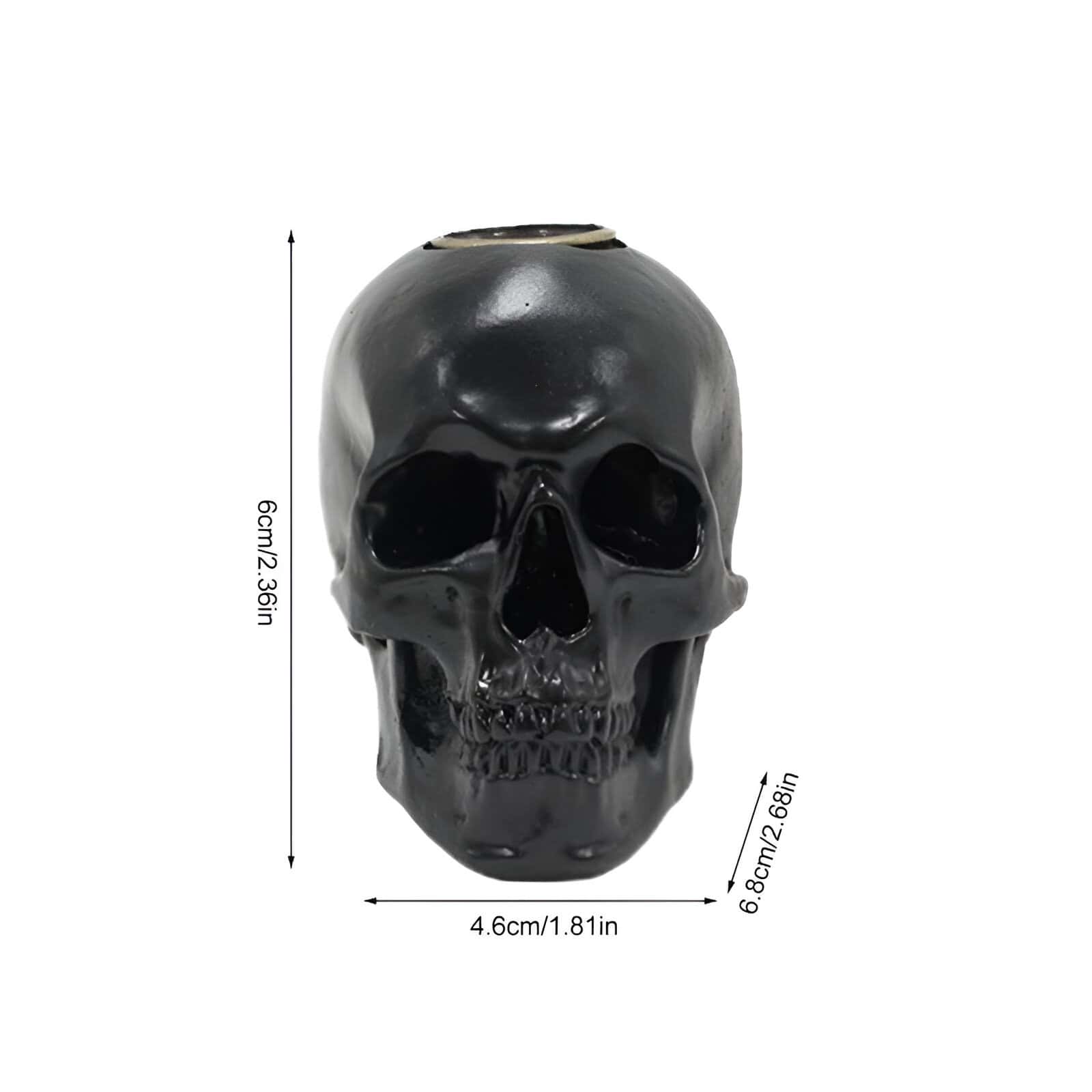 Black ceramic skull decor for Halloween and Gothic themed spaces, measuring 6cm x 4.6cm, ideal for home or office decoration, stylish skull ornament, unique gift idea.