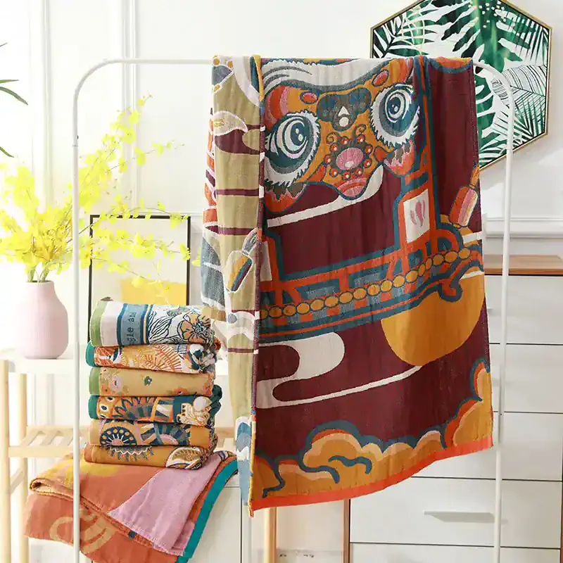 Vibrant colorful artistic towels displayed on a modern white towel rack with decorative wall art in the background. Perfect for bathroom decor, beach trips, or gifts.