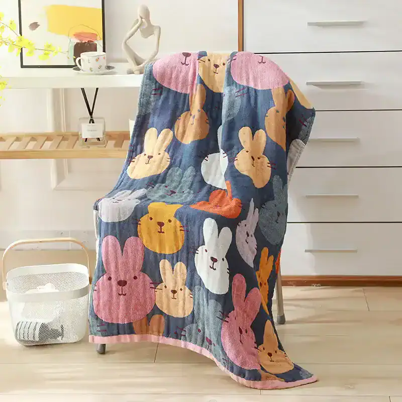 Fluffy bunny patterned blanket draped over chair for kids bedroom decor and comfort.
