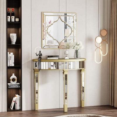 Elegant modern console table with gold accents and mirrored details in a stylish interior setting, perfect for luxury decor and home accents.