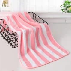 Soft pink and white striped plush towel perfect for spa, skincare, or beauty treatments available at Monalisa Store.