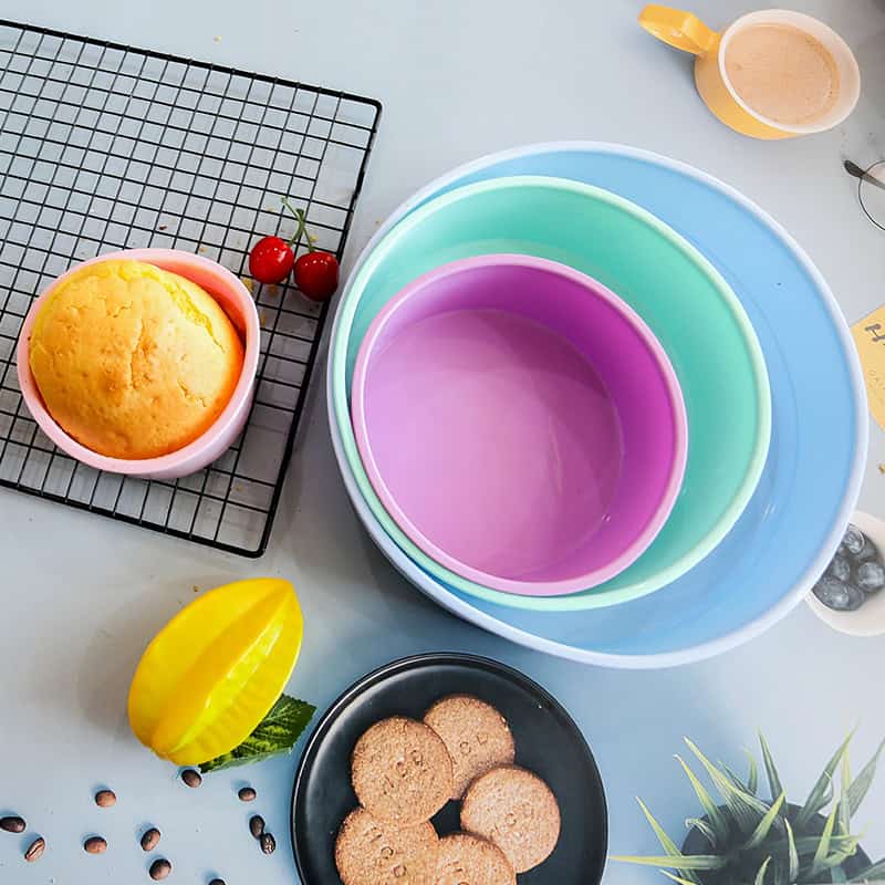 Colorful nested bowls for kitchen storage and serving, perfect for organizing fruits, snacks, or desserts, in a modern home setting.